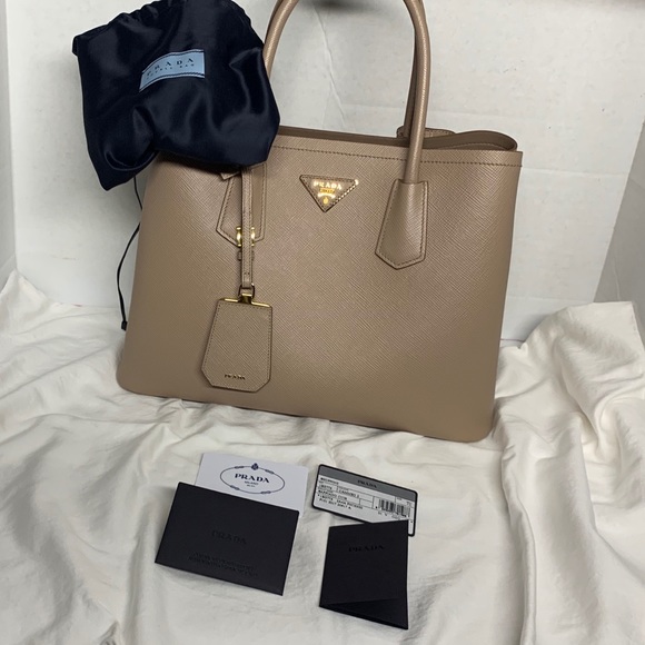 Prada Handbags - Saffiano cuir leather tote by Prada